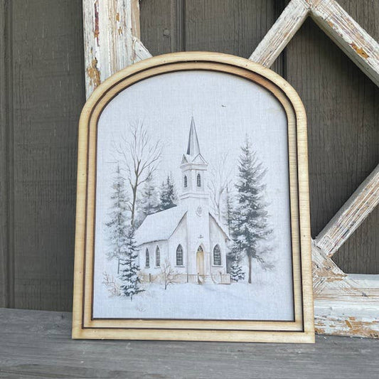 Snowy County Church with small arch double wood frame