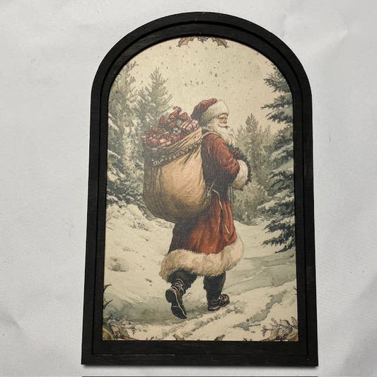 Snowy Forest w/Santa Carrying Sack Print in Med Arch Frame