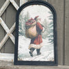 Snowy Forest w/Santa Carrying Sack Print in Med Arch Frame