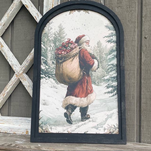 Snowy Forest w/Santa Carrying Sack Print in Med Arch Frame