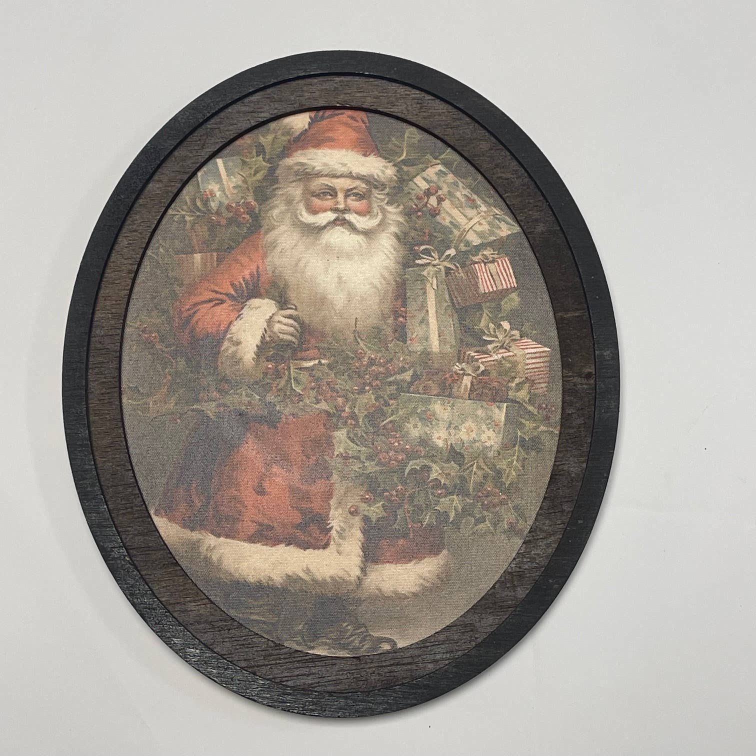 Santa w/ Holly Oval Framed Canvas Print