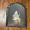 Ghost Swinging in Small Arched Frame