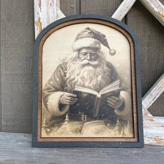 Vintage Santa Clause reading in small arch double frame