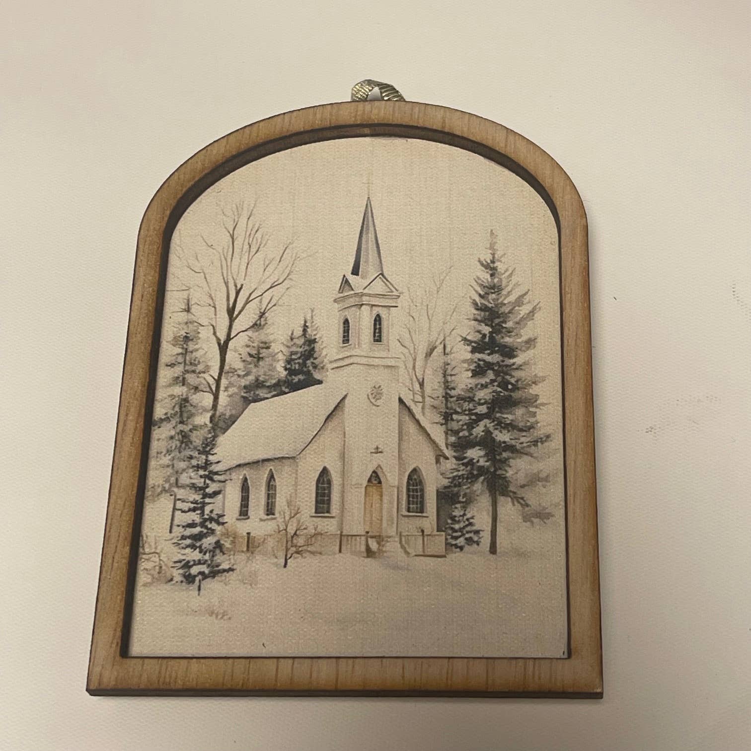 Snowy County Church with small arch double wood frame